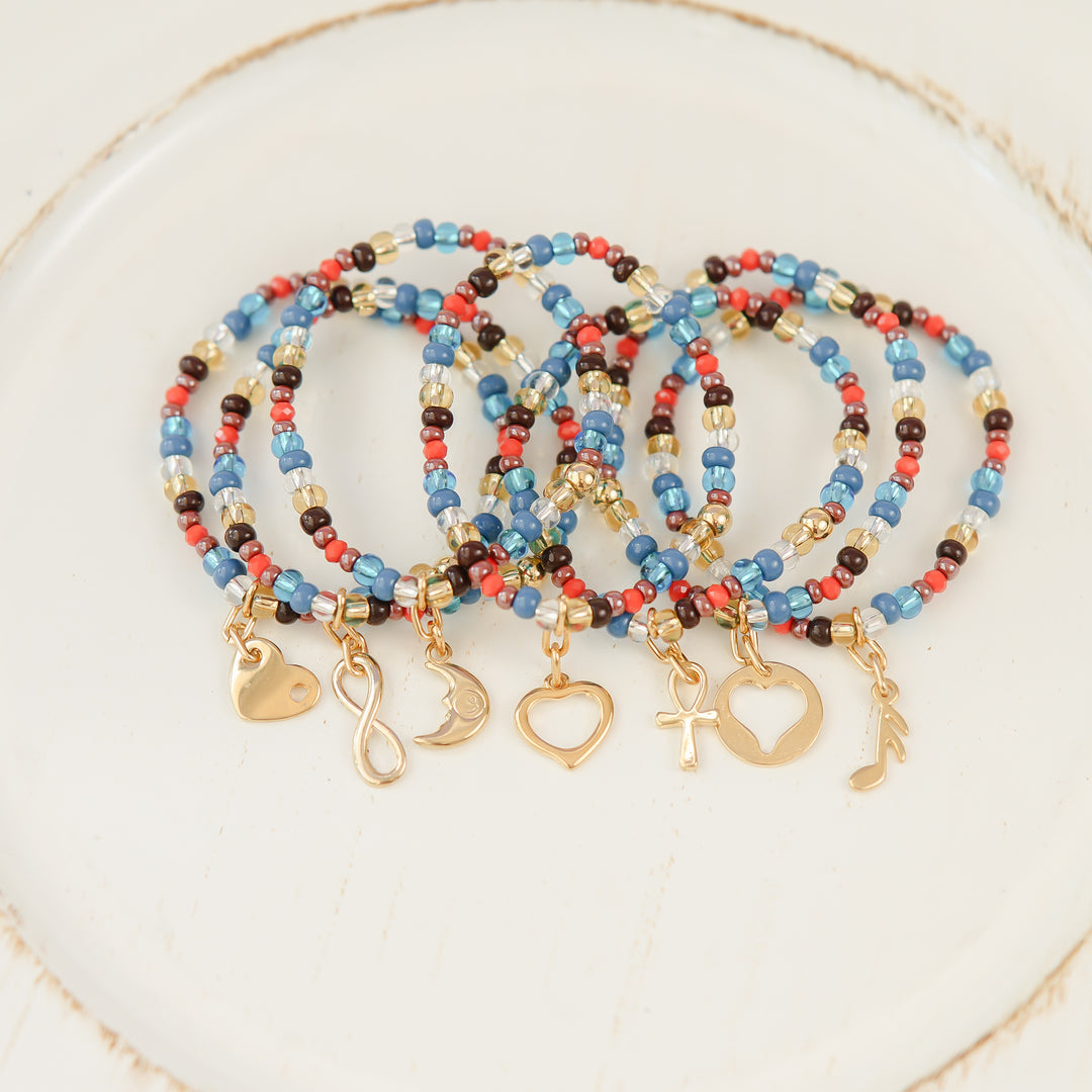 Pulsera semanario set siete pulseras dorada P109