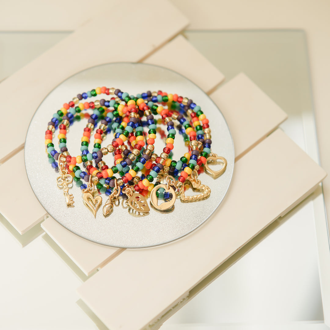 Pulsera semanario set siete pulseras dorada P109