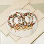 Load image into Gallery viewer, Pulsera semanario set siete pulseras dorada P109
